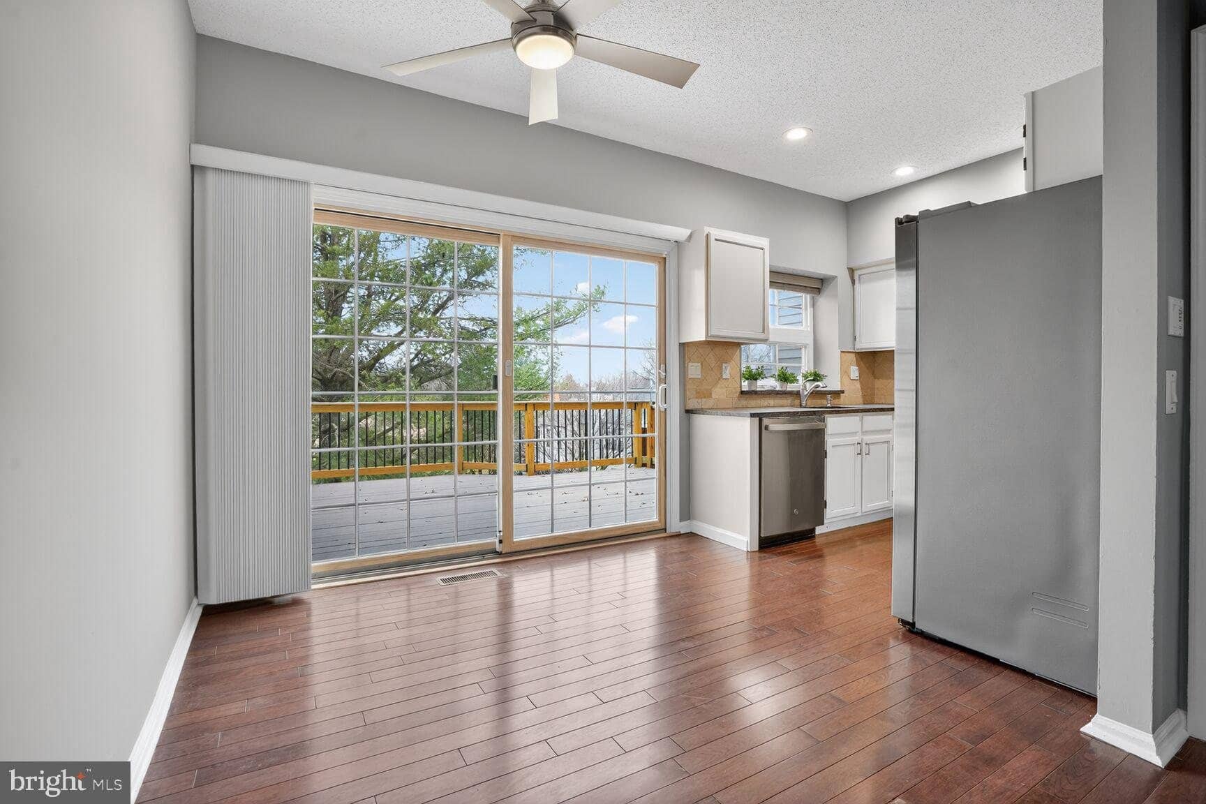 Dining area with sliding glass doors beside the kitchen