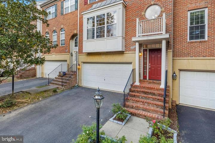 Driveway and brick front steps leading to the red entry door at 2969 Kildare Lane