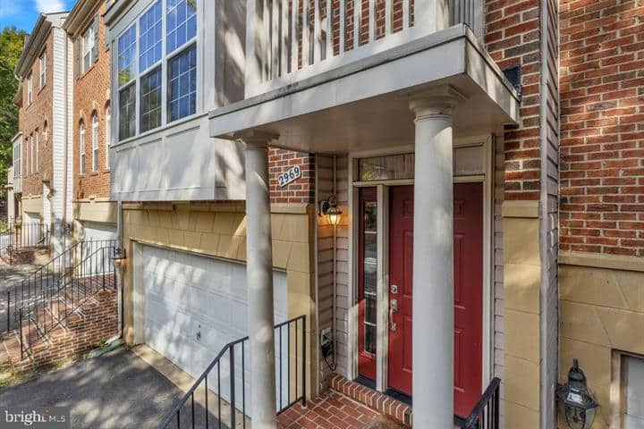 Columned front entrance beside the bay window and garage at 2969 Kildare Lane