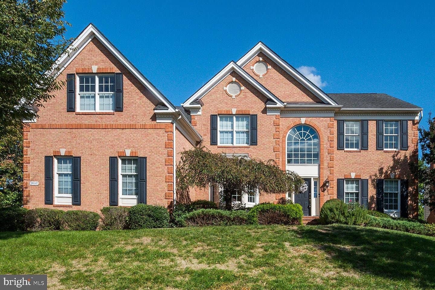 Front elevation of the brick home at 20347 Kiawah Island Drive